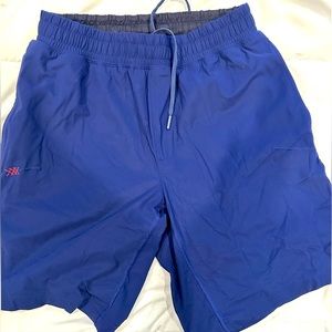 Rhone Versatility shorts 9 inch with liner. Size small excellent condition. Navy